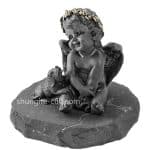 figurine of shungite angel and dog