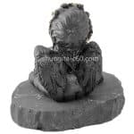 figurine of shungite angel and dog