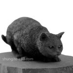 shungite figurine sneaking cat