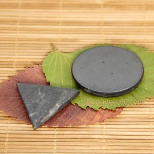 shungite circle and soapstone triangle