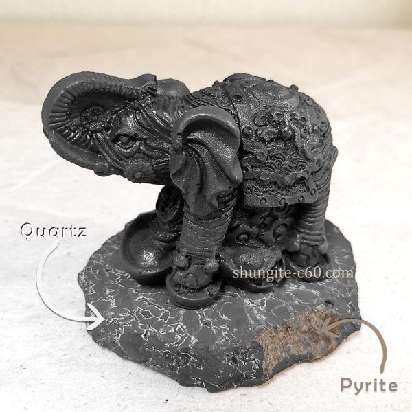 shungite stone figurine elephant and quartz