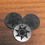 authentic shungite amulet sun engraved