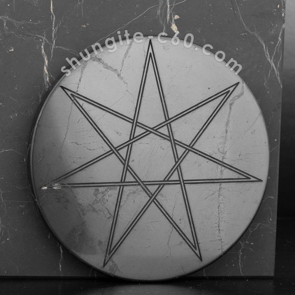 shungite plate septagram on a black stone