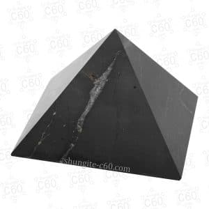 side view shungite pyramid with pyrite inclusions