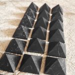 unpolished shungite stone pyramid